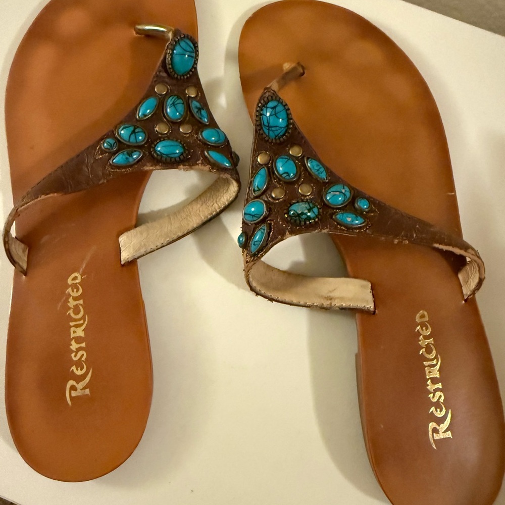 Restricted Brown Sandals with Turquoise Embellishments